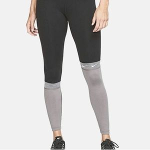 NIKE ONE 7/8 COLOR BLOCK RUNNING TIGHT. BLACK/GRAY. SIZE: XS